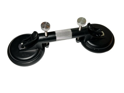 Присоска с механизмом перемещения (фиксации) листового материала